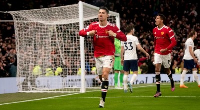 Ronaldo makes history as treble sinks Spurs, Liverpool close gap on Man City