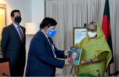 Momen hands over his book to PM Sheikh Hasina